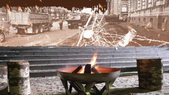 Ugunskurs un fonā attēls ar 1991. gada barikādēm