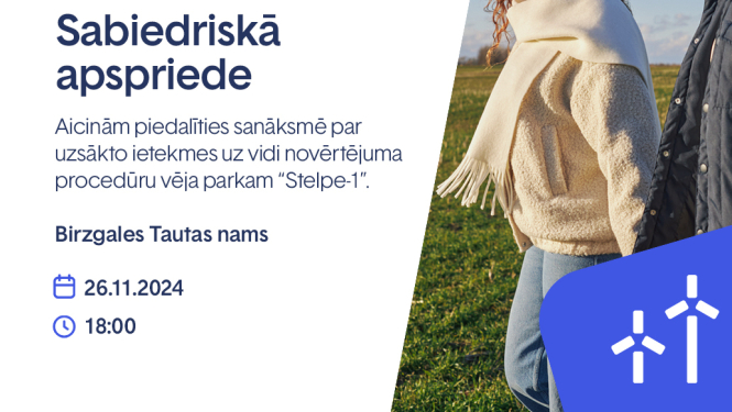 Vēja ģenerators un divi cilvēki - vīrietis un sieviete