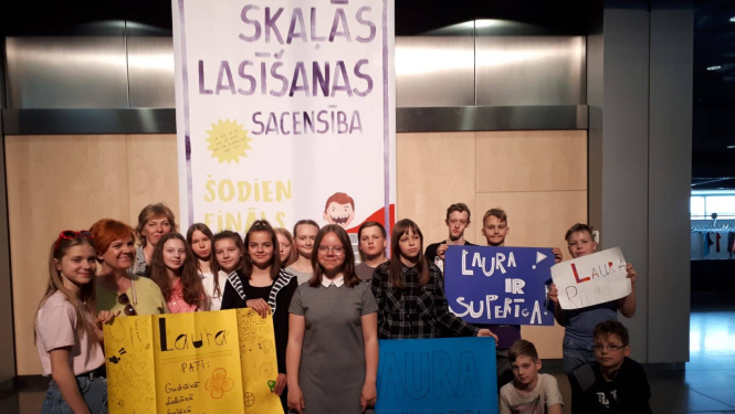 Ogrēniete iegūst trešo vietu Nacionālajā skaļās lasīšanas sacensībās