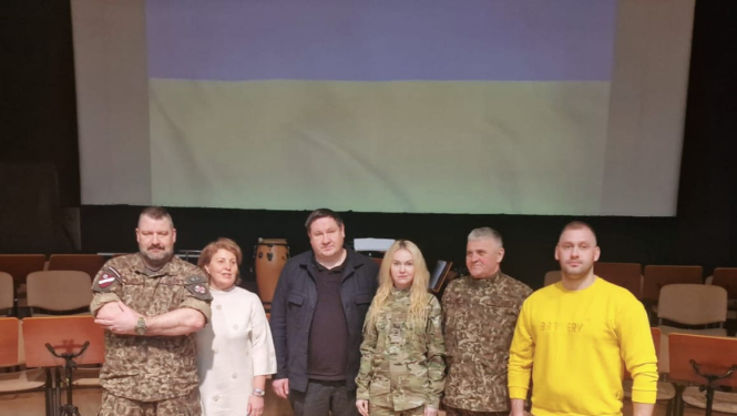 Egils Helmanis, Jānis SLiadiņš, Gerda, Alvis Lukšs tikšanās Madlienā par Ukrainā piedzīvoto 11.02.2024.