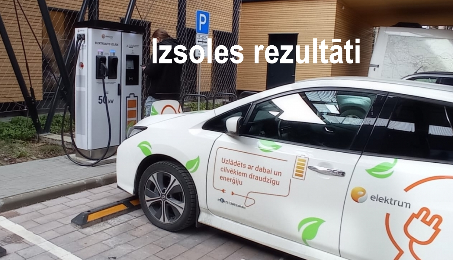 Elektrouzlādes stacija un elektroautomobilis